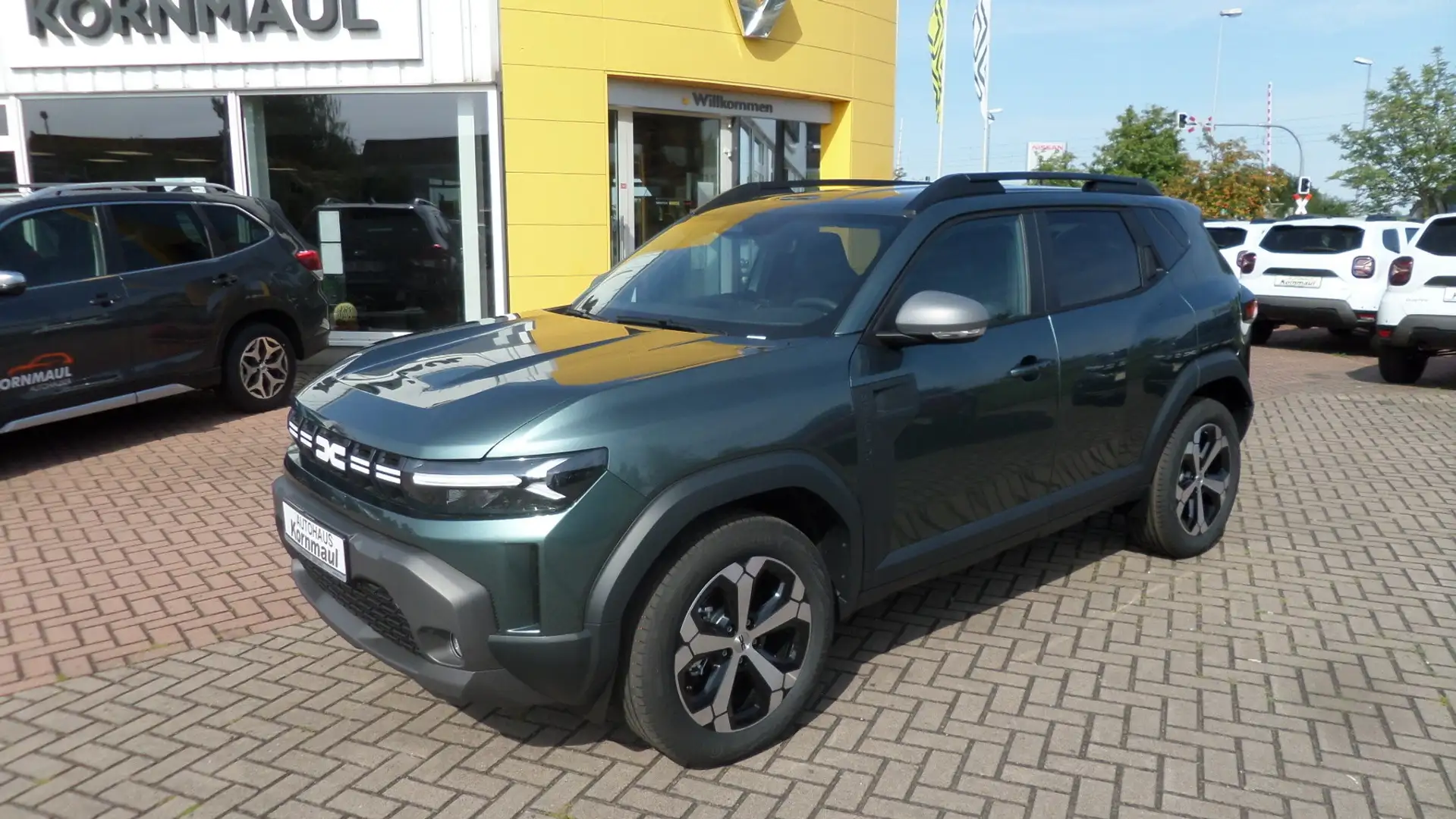 Dacia Duster Journey III HYBRID 140 PS mit Winterpaket Navi, Rü Vert - 1