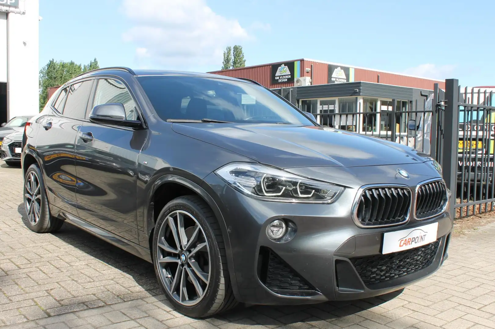 BMW X2 SDrive20i High Executive M Pakket Leer Navi Clima Grijs - 2