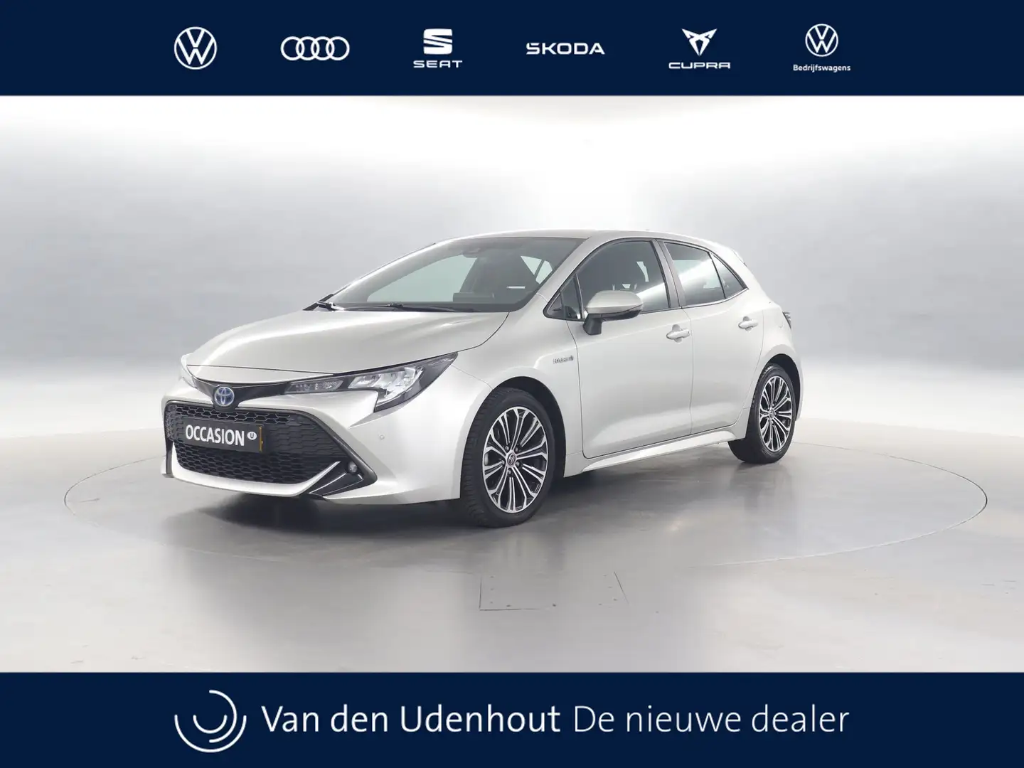 Toyota Corolla 1.8 136pk Hybrid Dynamic / Navigatie / Stoelverwar Gris - 1