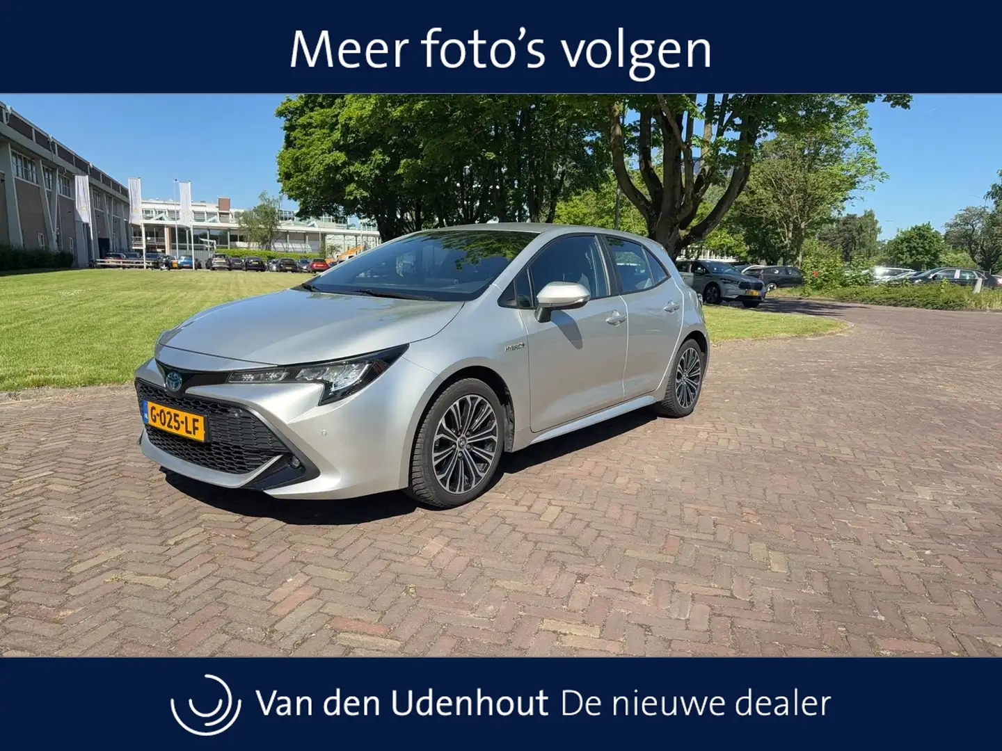 Toyota Corolla 1.8 98pk Hybrid Dynamic / Navigatie / Stoelverwarm Grijs - 1