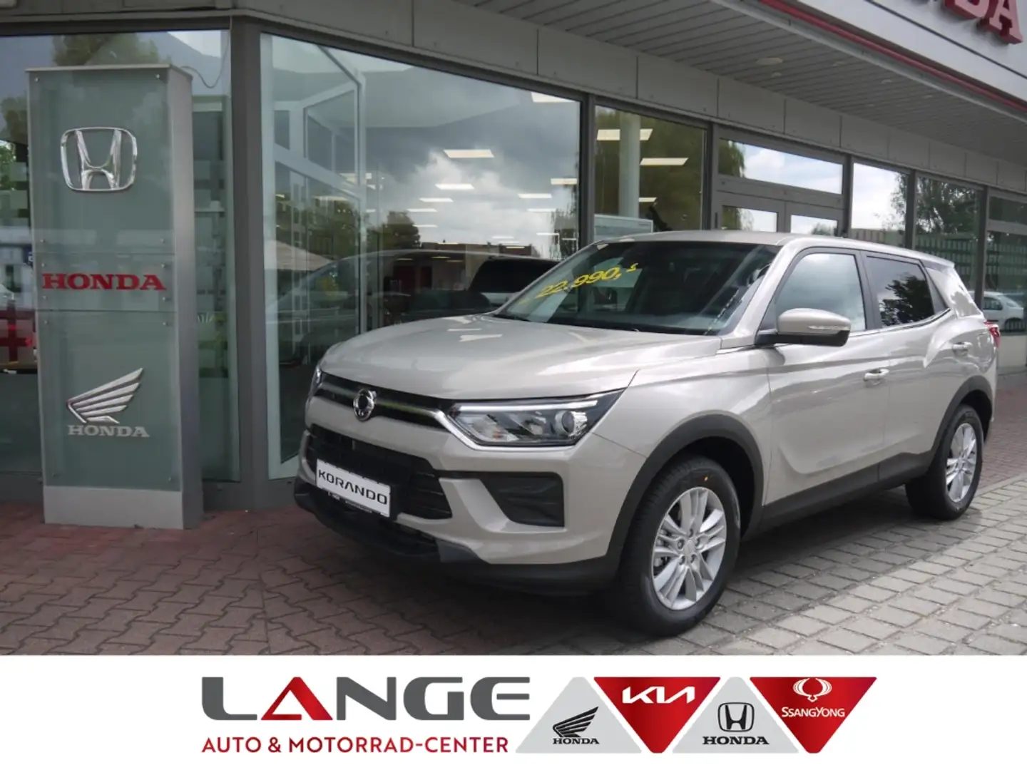 KGM Tivoli Korando 1.5 T-GDi Nomad Automatik Navi SHZ Temp Te Beige - 1