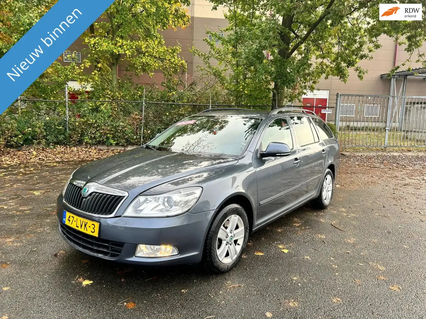 Skoda Octavia Combi 1.2 TSI Ambition Business Line MET NWE APK Grijs - 1