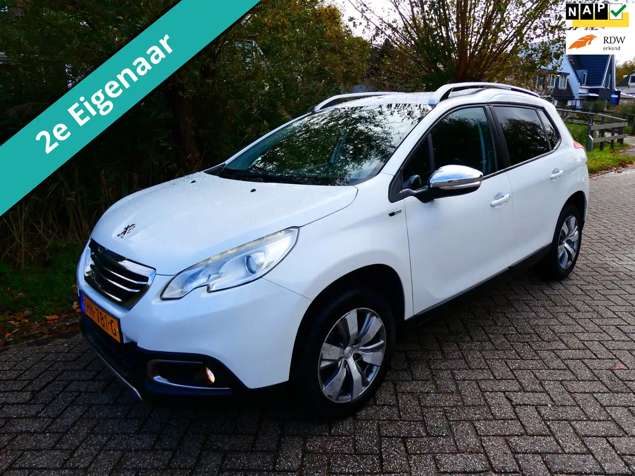 Peugeot 2008 1.2i Style 2e eig. Airco Cruise Navi 150.000km His — photo 1 of 26