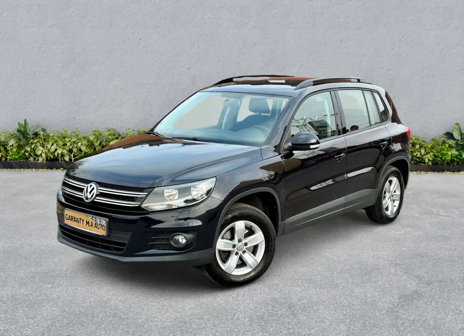 Volkswagen Tiguan 1.4 TSI 122 BlueMotion Technology/ ETAT NEUF - 1