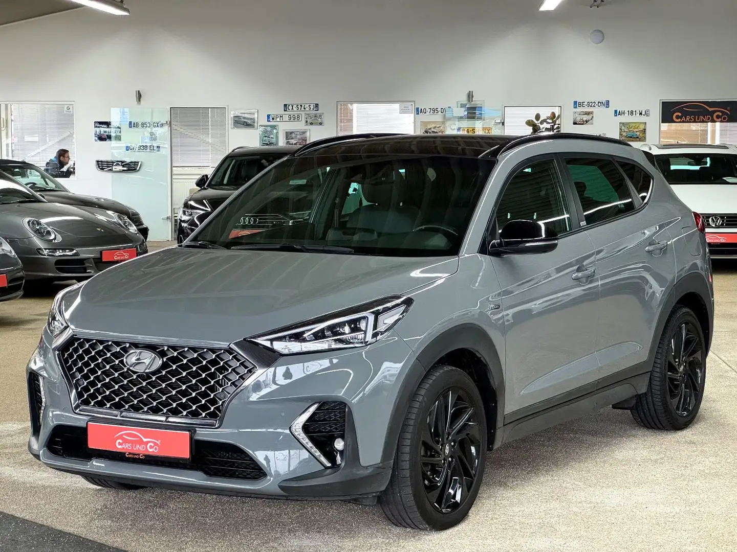 Hyundai TUCSON 2.0 CRDi N-Line 4WD *LED*NAV*PAN*ACC*360° Grijs - 1
