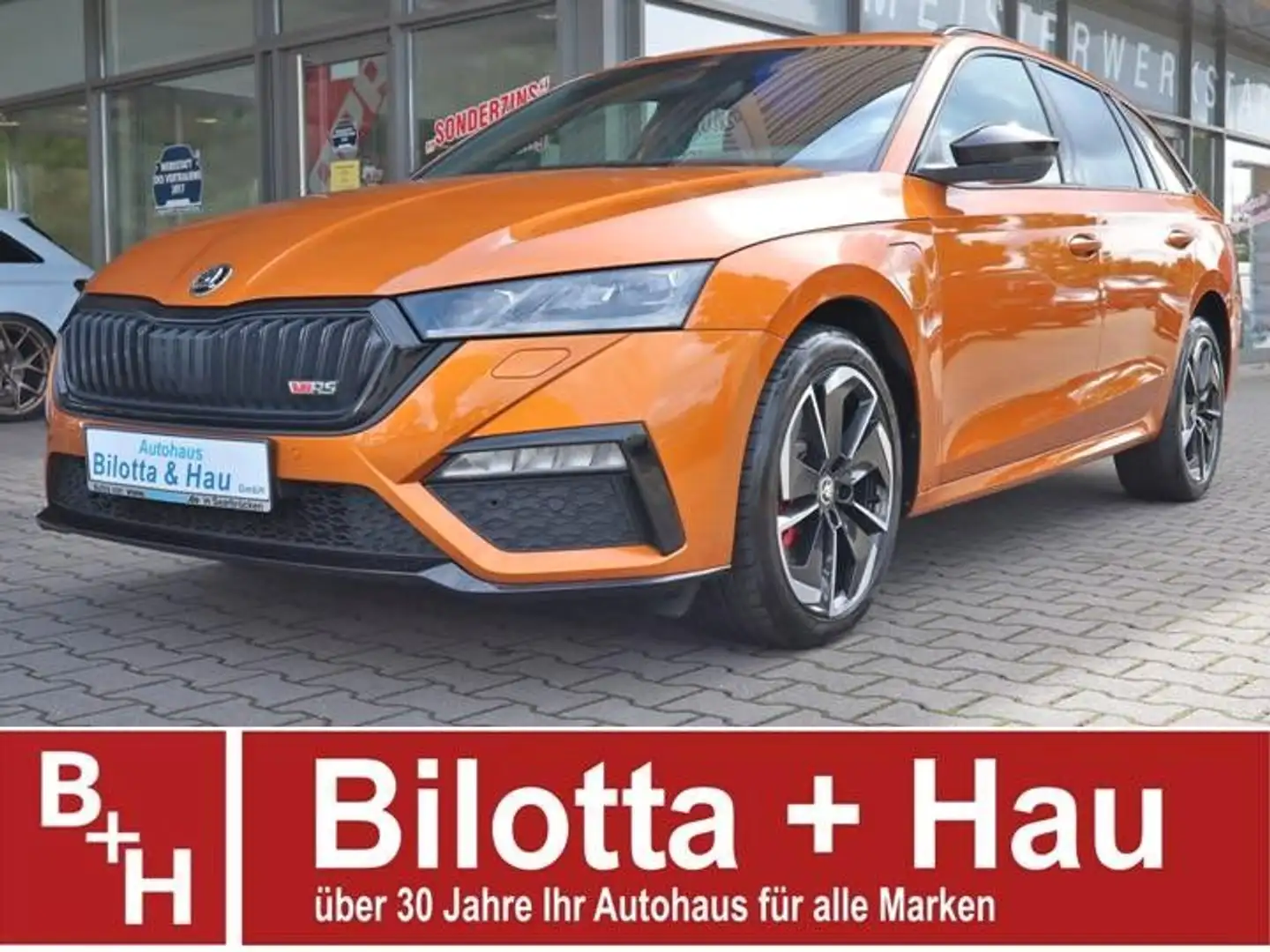 Skoda Octavia Combi RS 1.4 TSI iV DSG !LED+Navi+Pano! Oranje - 1