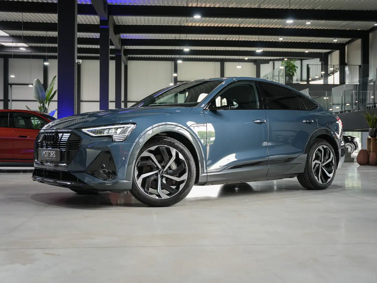 Audi e-tron 95 kWh 55 Sportback Quattro Blau - 1