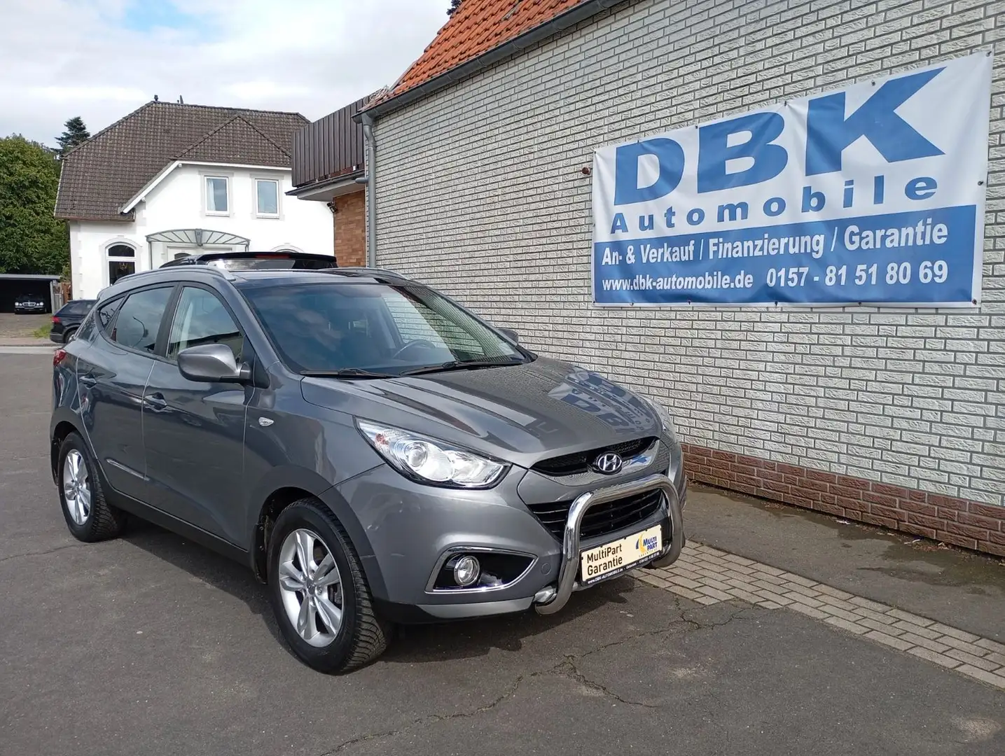 Hyundai iX35 Style 2WD Leder Klima AHK Autom. SHZ Panora Grijs - 2
