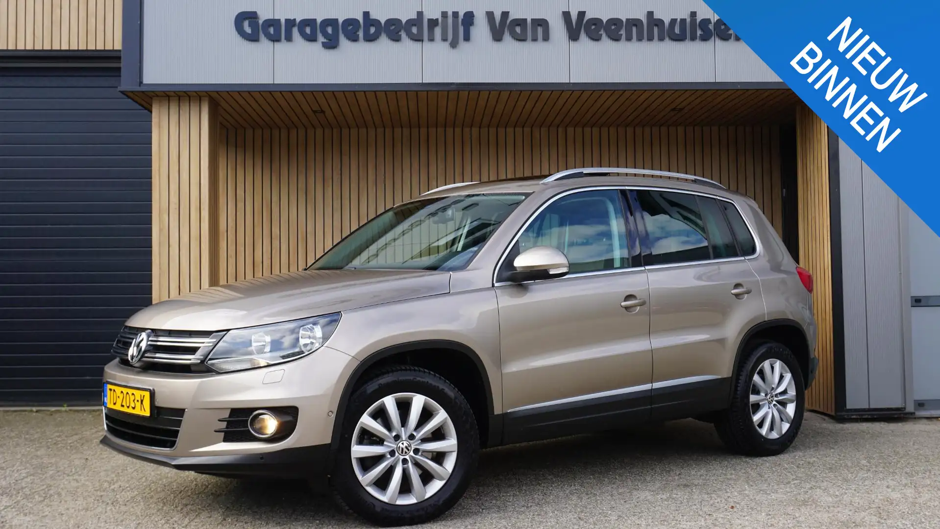 Volkswagen Tiguan 1.4 TSI 161PK Sport&Style Pano.Dak Alcantara 17inc Geel - 1