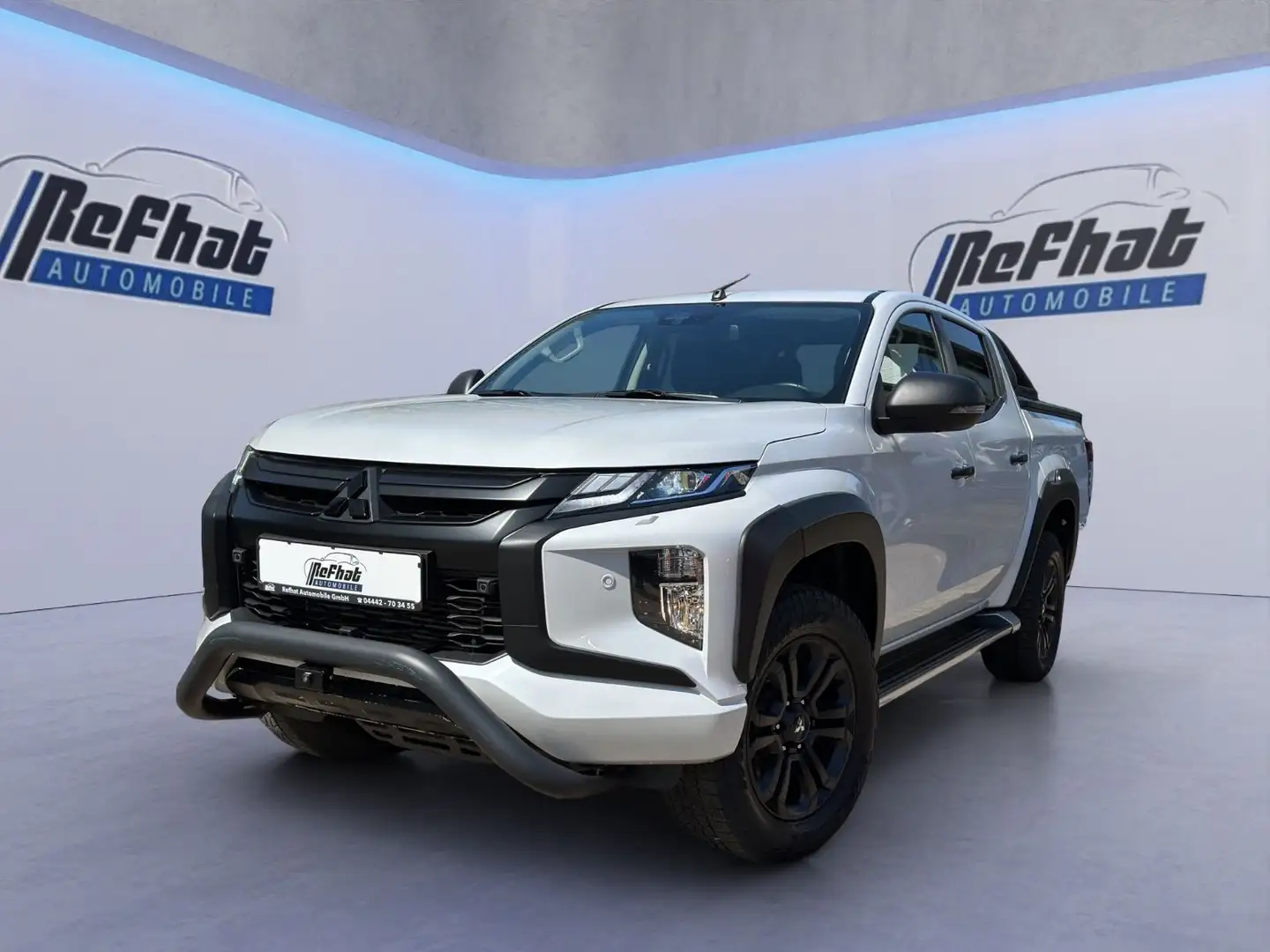 Mitsubishi L200 Doppelkabine 4WD*PDC*SHZ*NAVI*AHK*SPUR*360* Weiß - 1