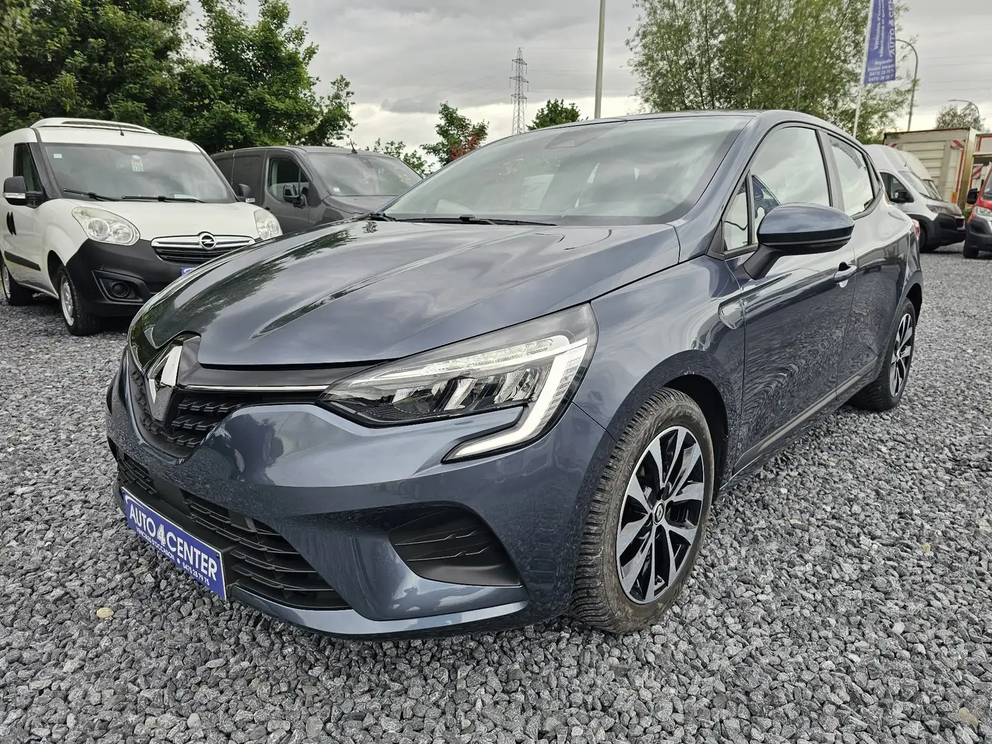 Renault Clio 1.0 TCe Intens // GPS / GARANTIE 1 AN // Gris - 1