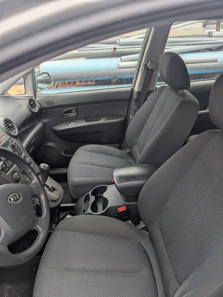 Kia Rondo снимка Kia Rondo