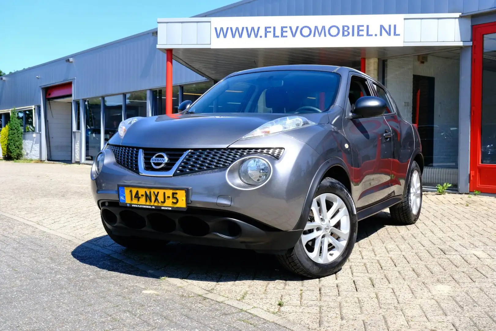 Nissan Juke 1.6 Visia Eco Airco|PDC|LMV|Elec Rmn Grijs - 1