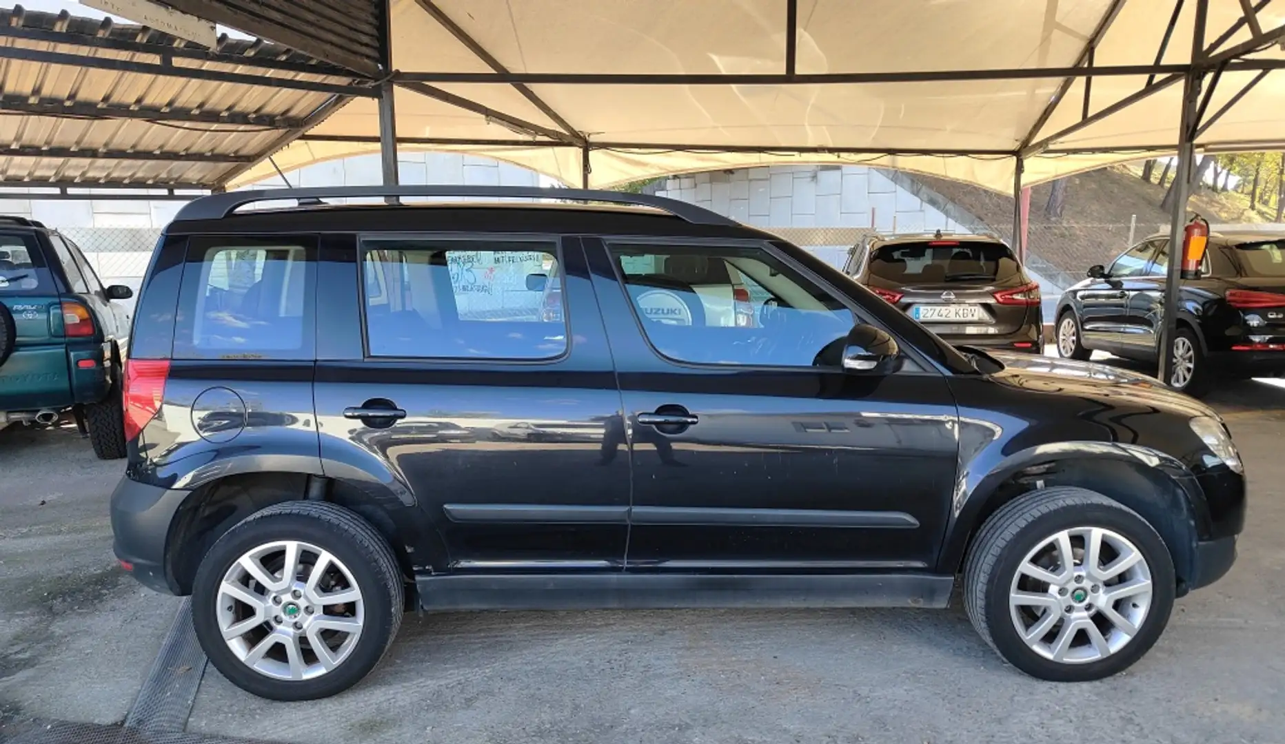 Skoda Yeti 1.2 TSI Ambition 4x2 Schwarz - 2
