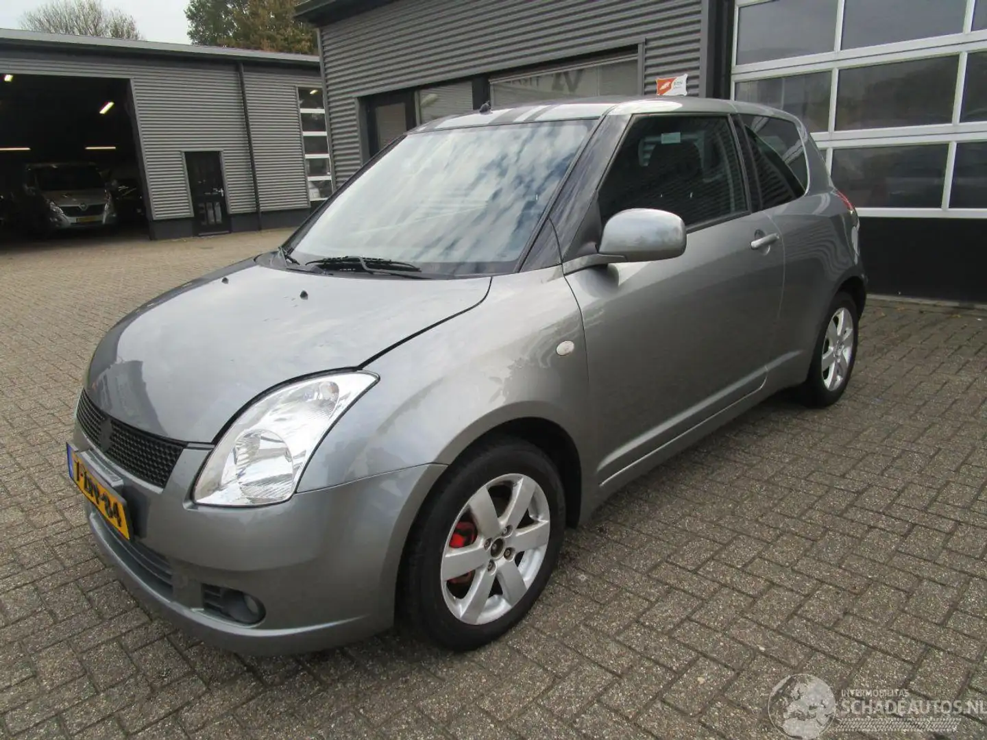 Suzuki Swift 1.3 Comfort Grau - 1