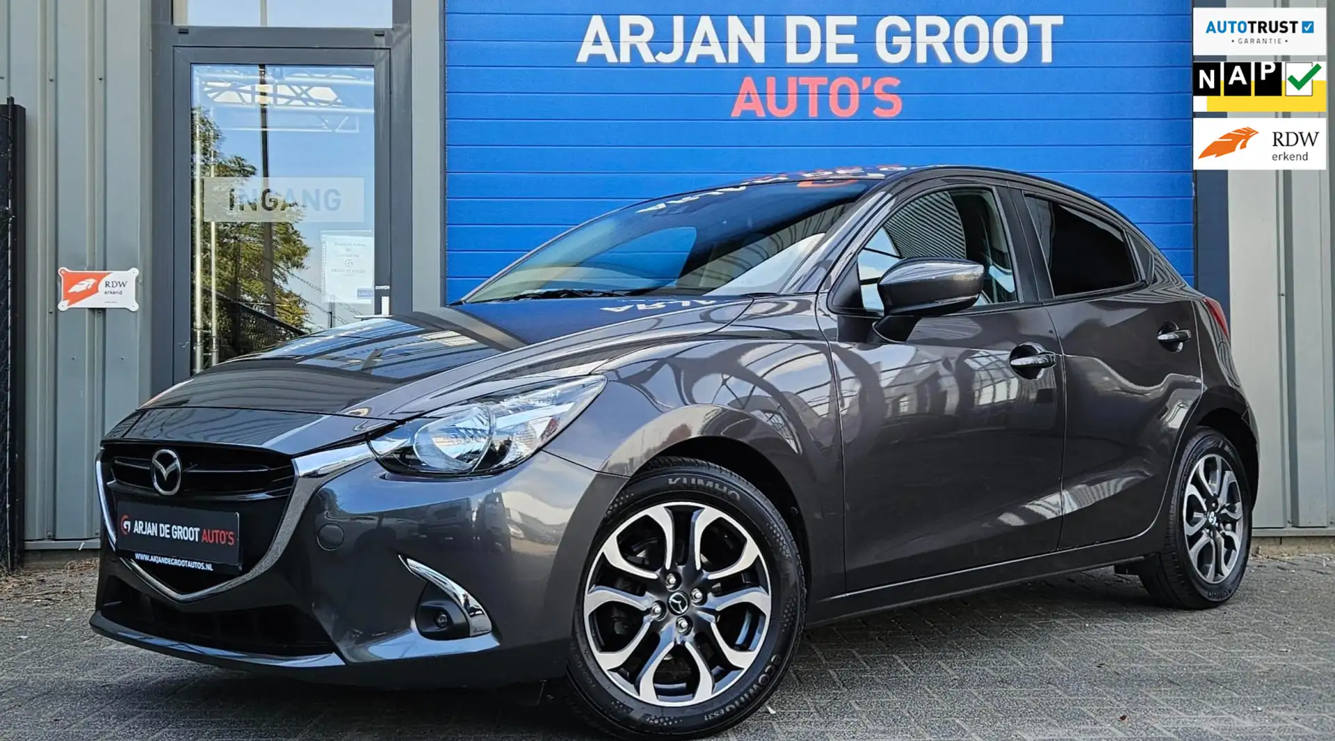 Mazda 2 1.5 Skyactiv-G 90PK AUTOMAAT Navi Cruise Clima Pdc Grijs - 1