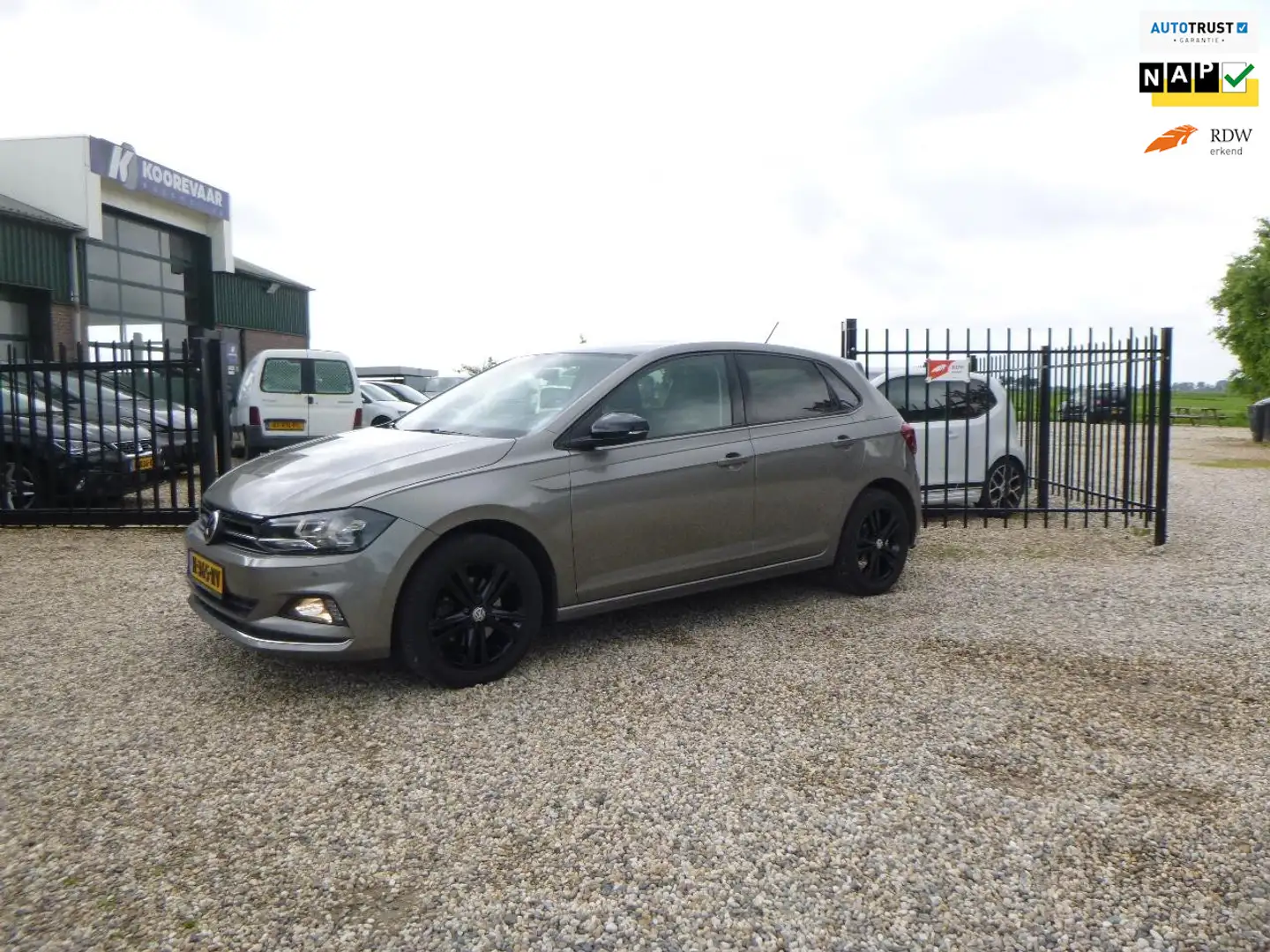 Volkswagen Polo 1.0 TSI Highline Business R met spuitwerk Gris - 1