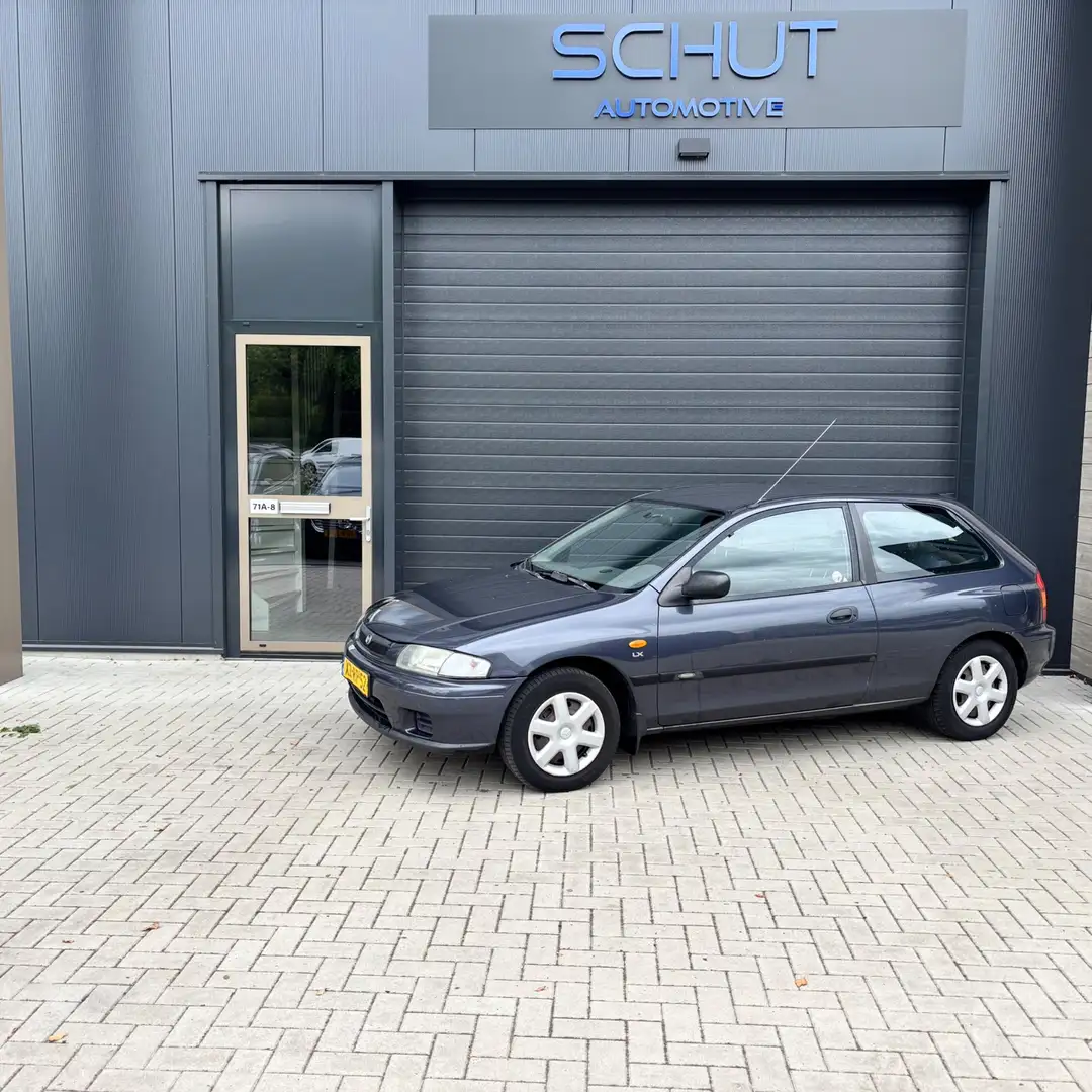 Mazda 323 1.3i P LX 3DRS APK 04-2027 | 132DKM | !!!UNIEK!!! Blau - 1