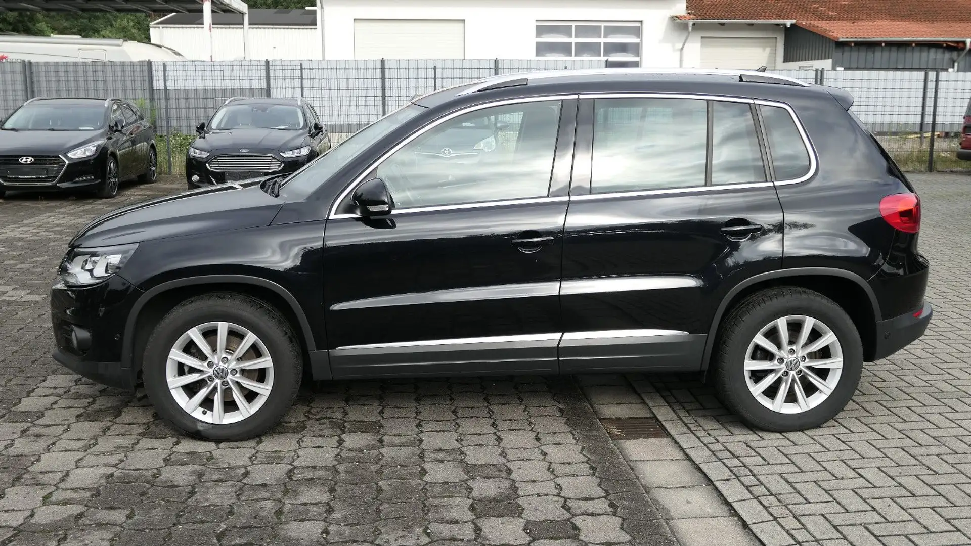 Volkswagen Tiguan Sport & Style BMT/Bi-Xenon/Sitzheizung Zwart - 2