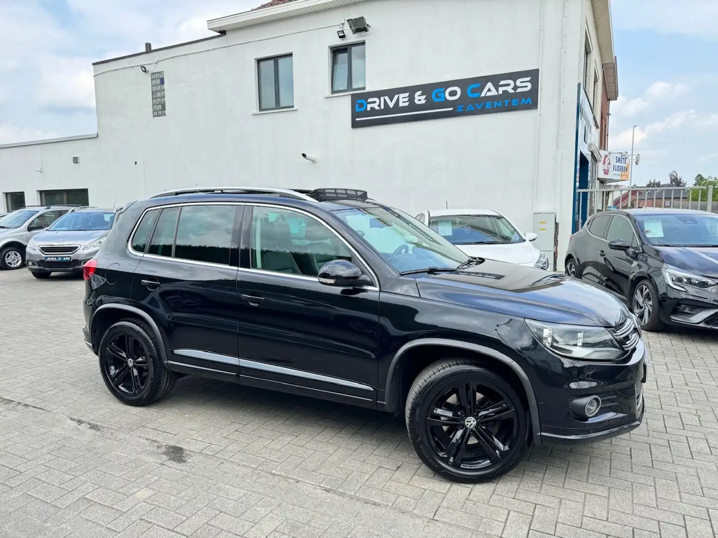 Volkswagen Tiguan 1.4 TSI R-Line FULL OPTION ** 1 JAAR GARANTIE ** Noir - 1