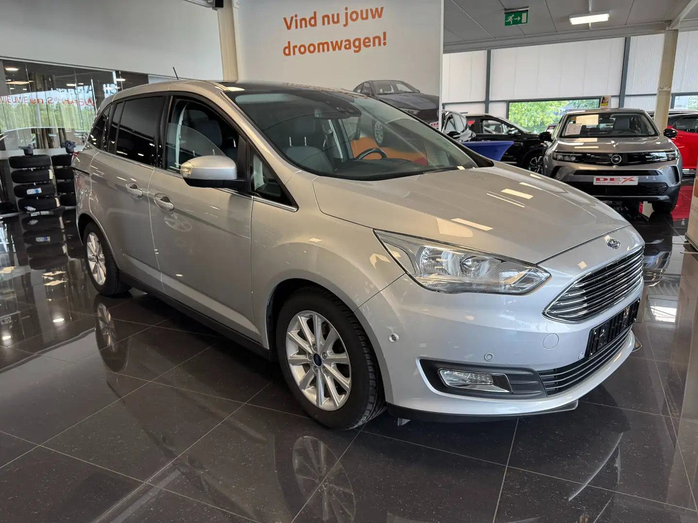 Ford Grand C-Max Grand C-Max 1.5 TDCi Titanium/Navigatie/7pl/1j gar Zilver - 1