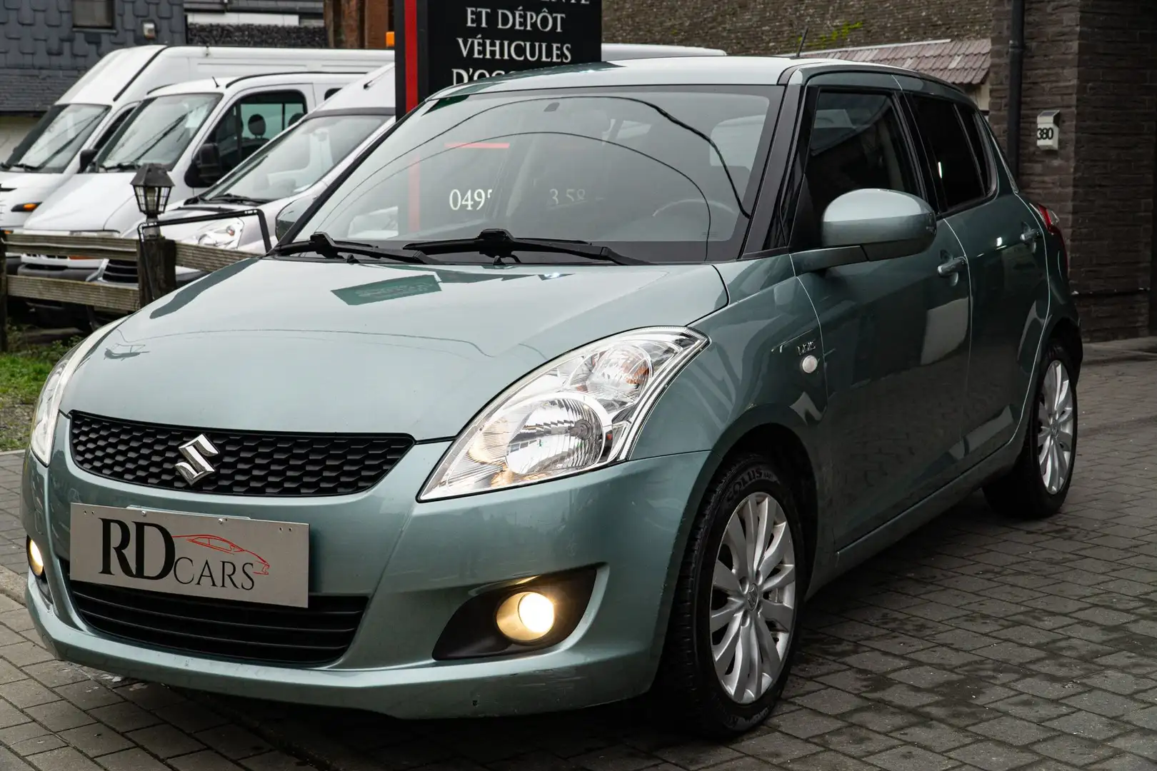 Suzuki Swift 1.3 DDiS GL Airco*SPORT*JANTES ALU*GARANTIE 12MOIS Verde - 1