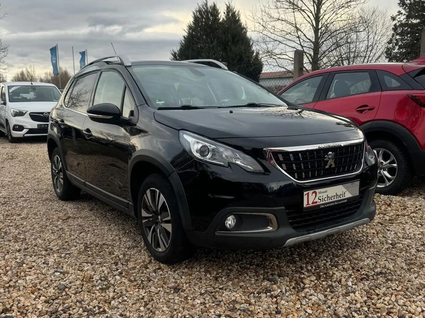 Peugeot 2008 Allure*SHZ*Navi*Garantie* Schwarz - 1