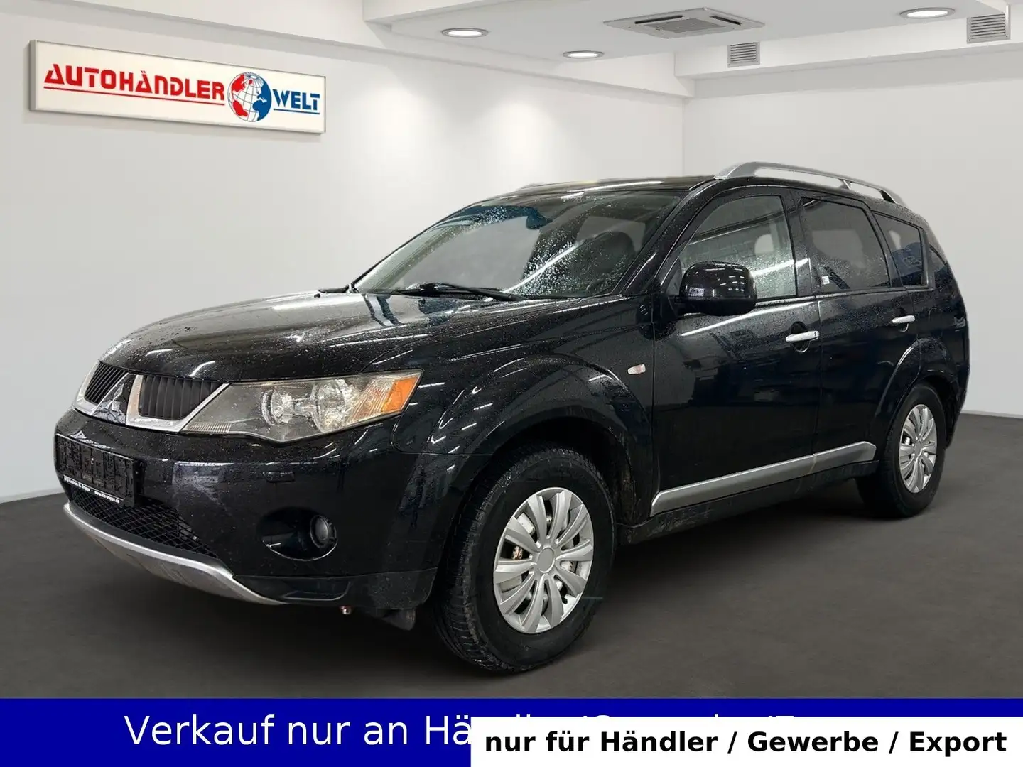 Mitsubishi Outlander 2.0 DI-D 7-Sitzer 4x4 AC Leder SHZ Nav Schwarz - 1