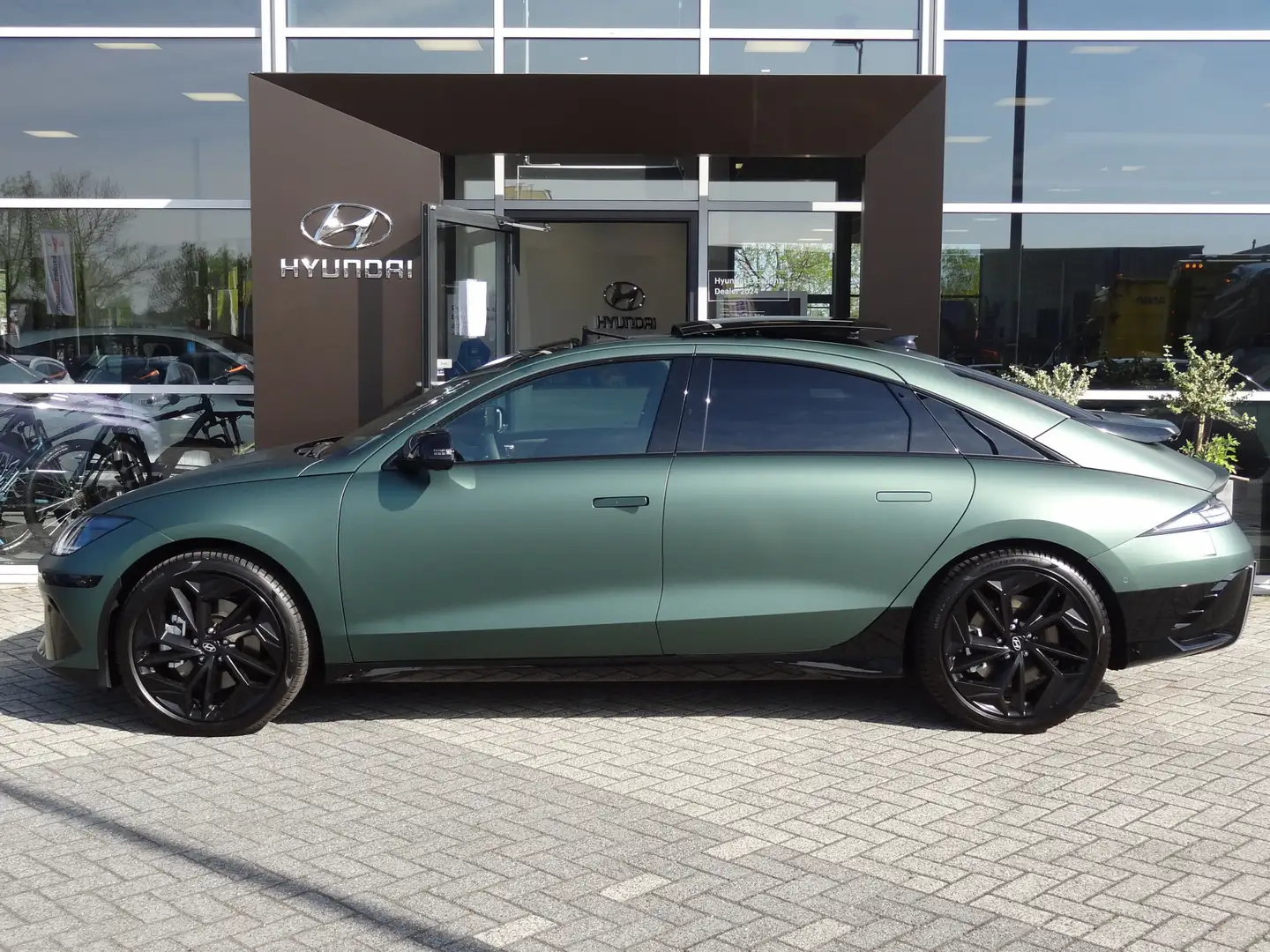 Hyundai IONIQ 6 First Edition AWD|CARWRAP mat groen| Open dak| UNI Lilla - 2