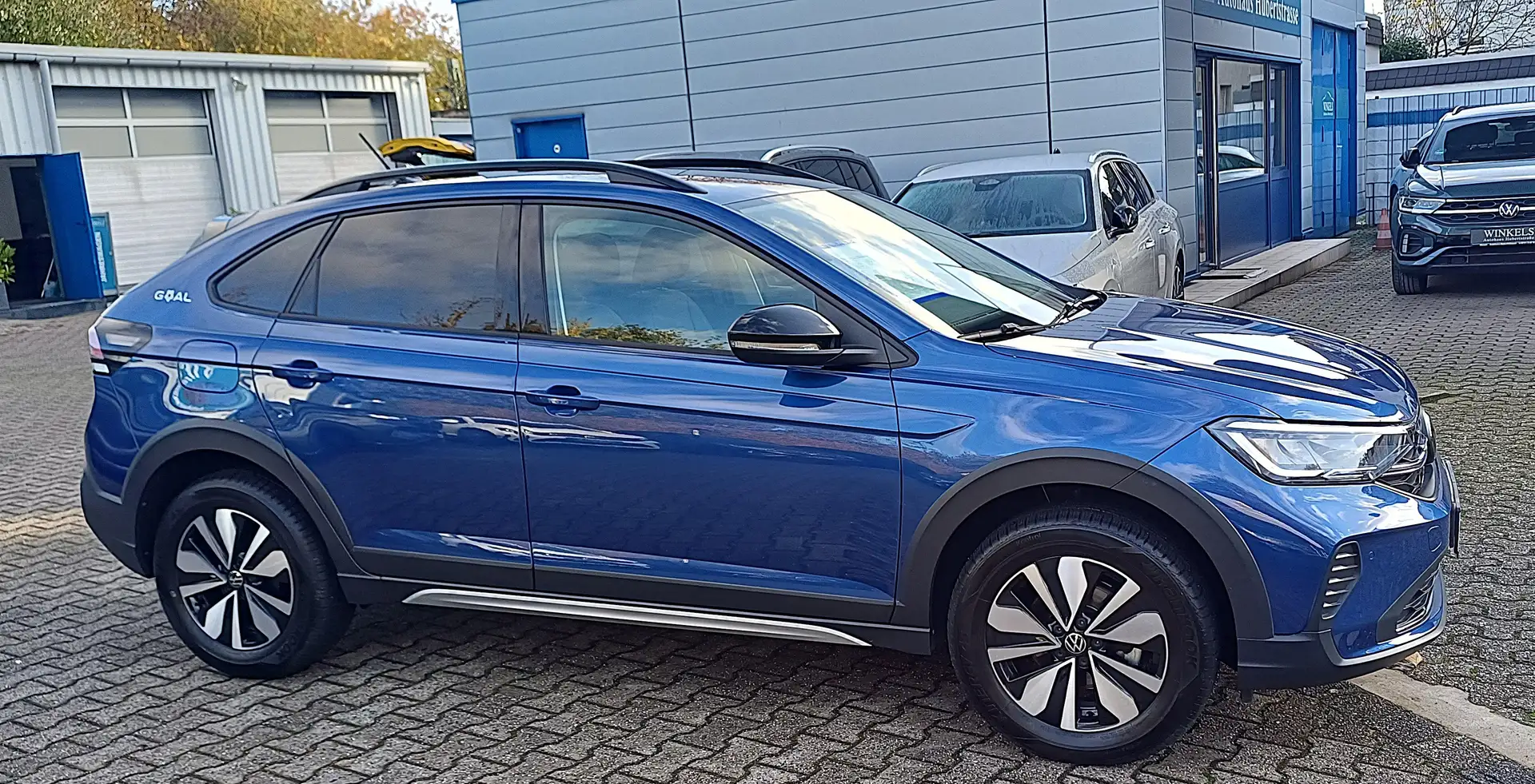 Volkswagen Taigo Taigo Goal-Klimaaut-Navi-Leder-Alu-PDC-SH-5Jahre Blau - 2