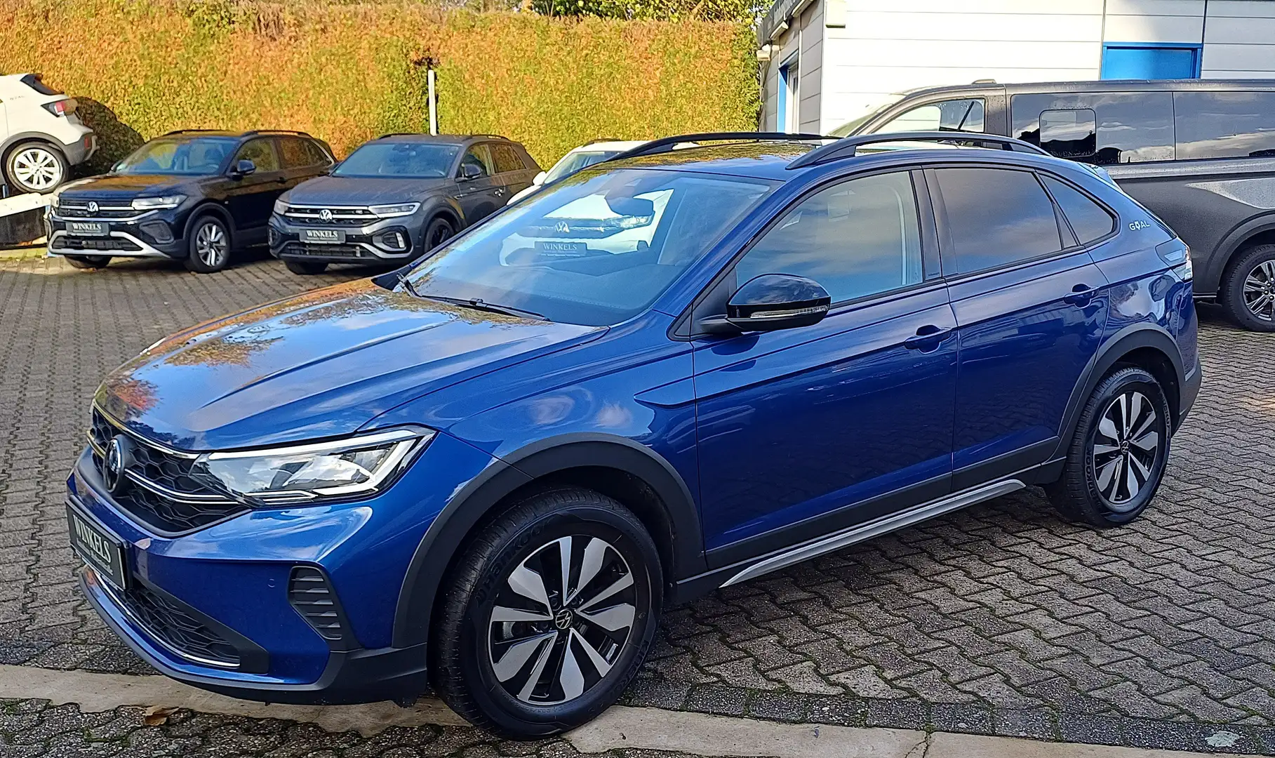 Volkswagen Taigo Taigo Goal-Klimaaut-Navi-Leder-Alu-PDC-SH-5Jahre Blau - 1