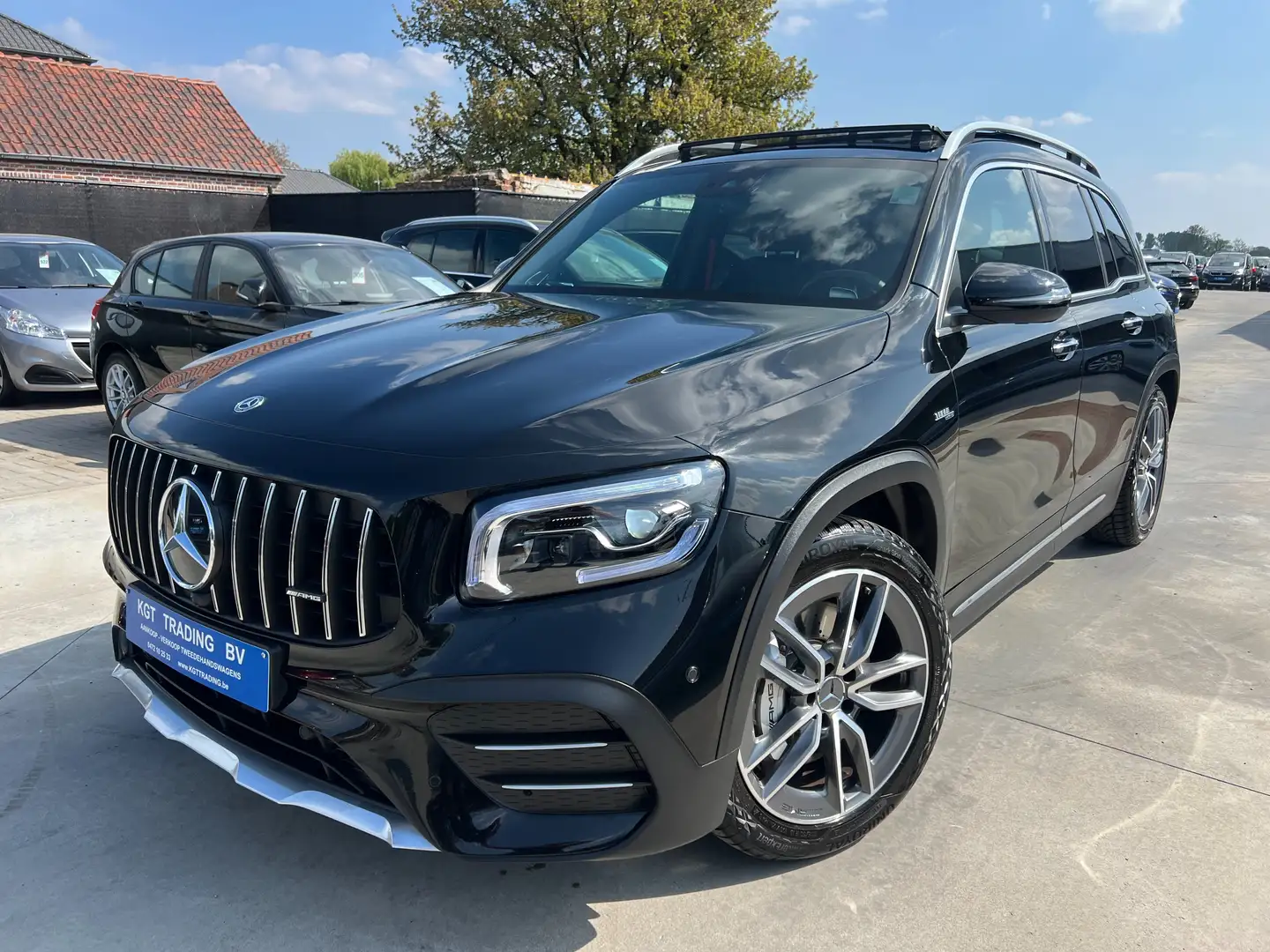 Mercedes-Benz GLB 35 AMG 4 MATIC 7 ZIT NAVIGATIE LEDER OPENDAK BURMESTER Noir - 1