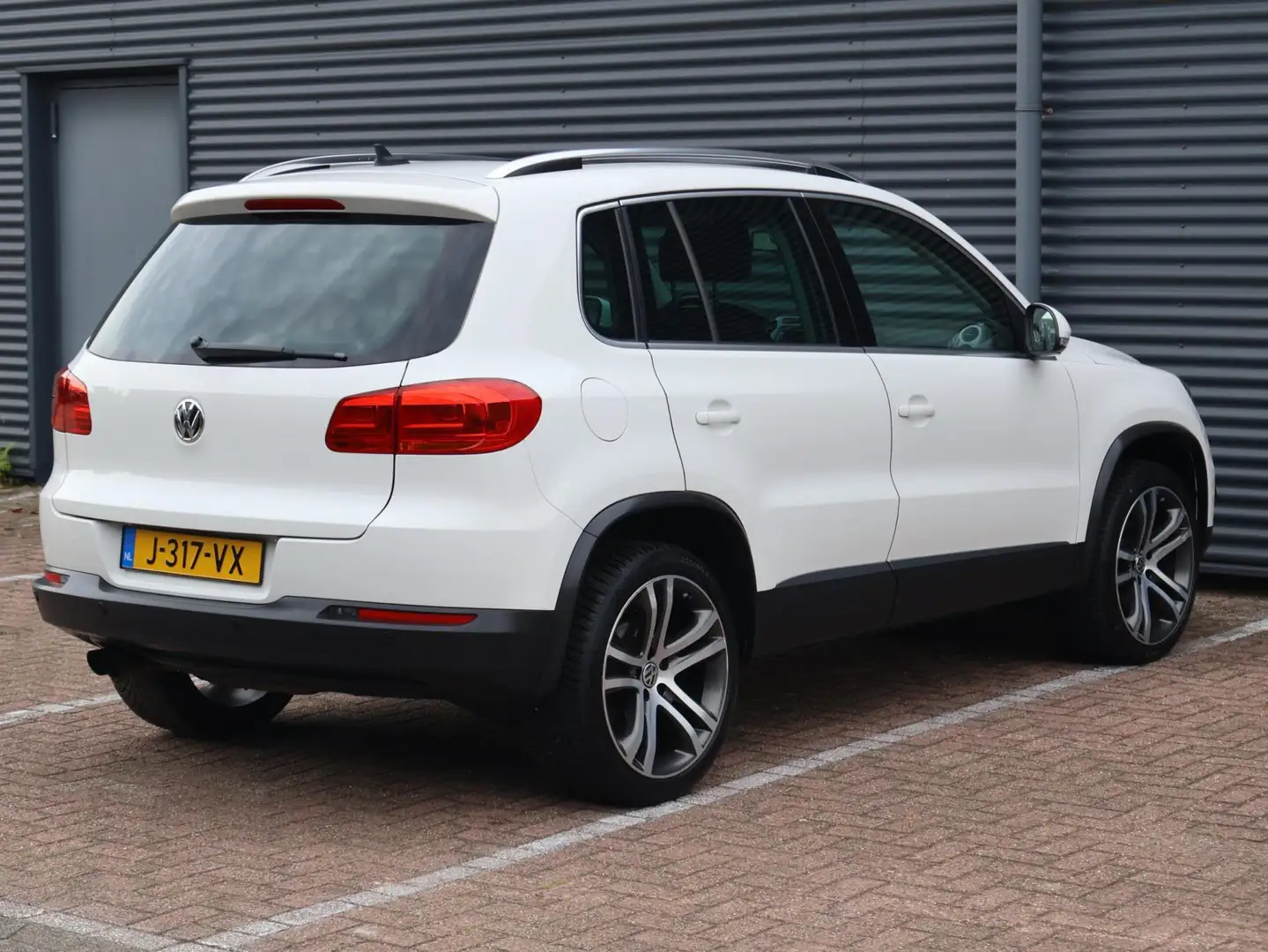 Volkswagen Tiguan 2.0 TSI Sport&Style 4Motion|Pano|Cam|Nav|Automaat| Blanc - 2