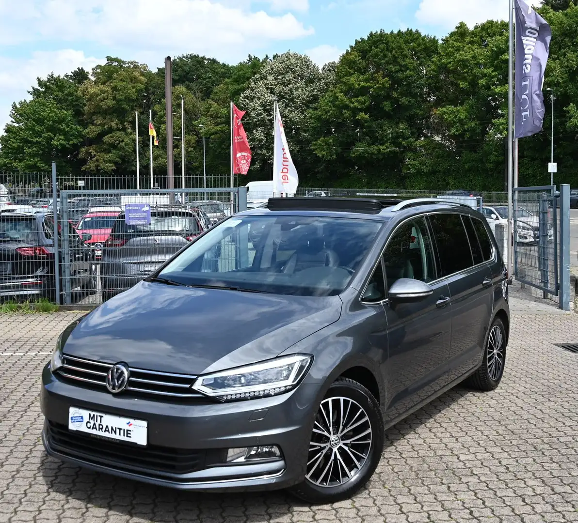 Volkswagen Touran 1.8 TSI DSG Highline Navi Leder 7Sit Pano Grijs - 1