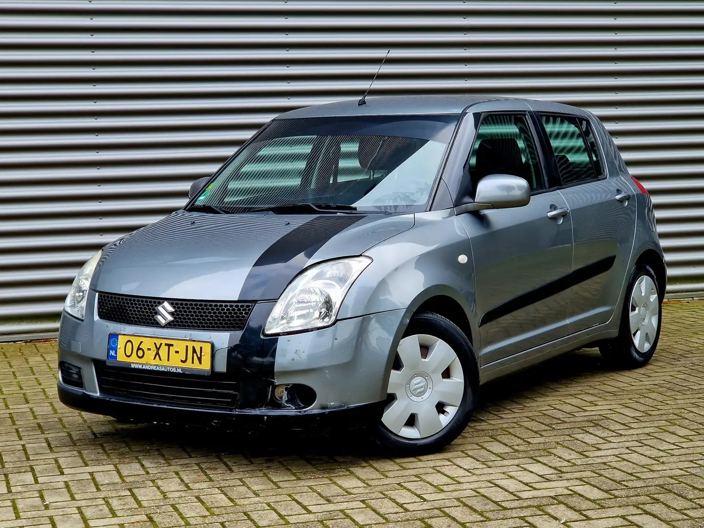 Suzuki Swift 1.3 GLS Gris - 1