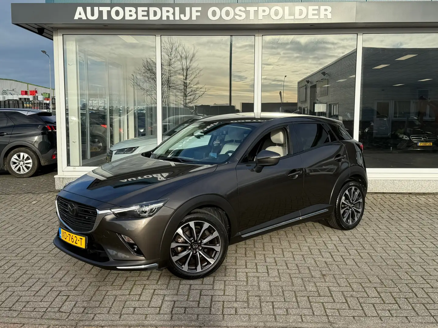 Mazda CX-3 2.0 SkyActiv-G 120 GT-M Automaat Bruin - 1