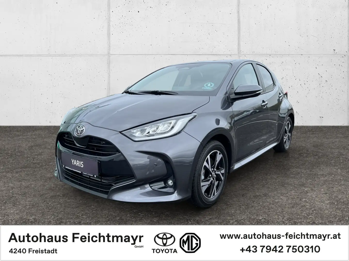 Toyota Yaris 1,5 Hybrid Ac. Dr. Safety-P. Comfort-P. 5t. Grau - 1