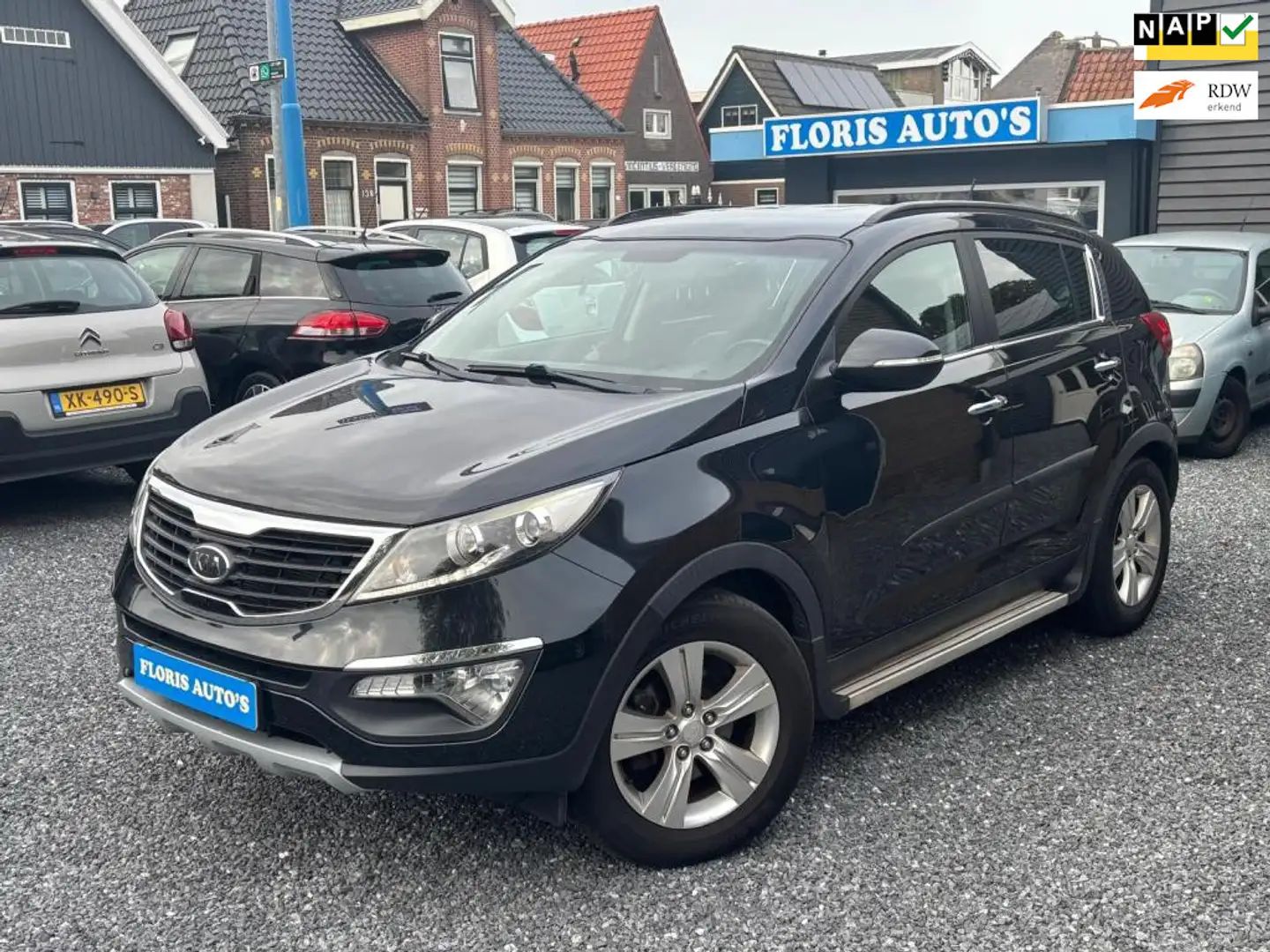 Kia Sportage 1.6 GDI X-ecutive Plus Pack | Trekhaak | Rijklaar! Zwart - 1