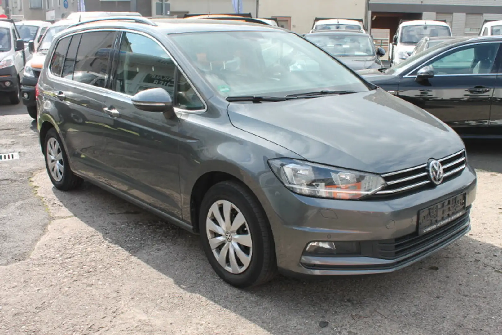 Volkswagen Touran 1,6 TDi DSG Comfort Navi 7-Sitz 1.Hd Scheckheft Grijs - 1