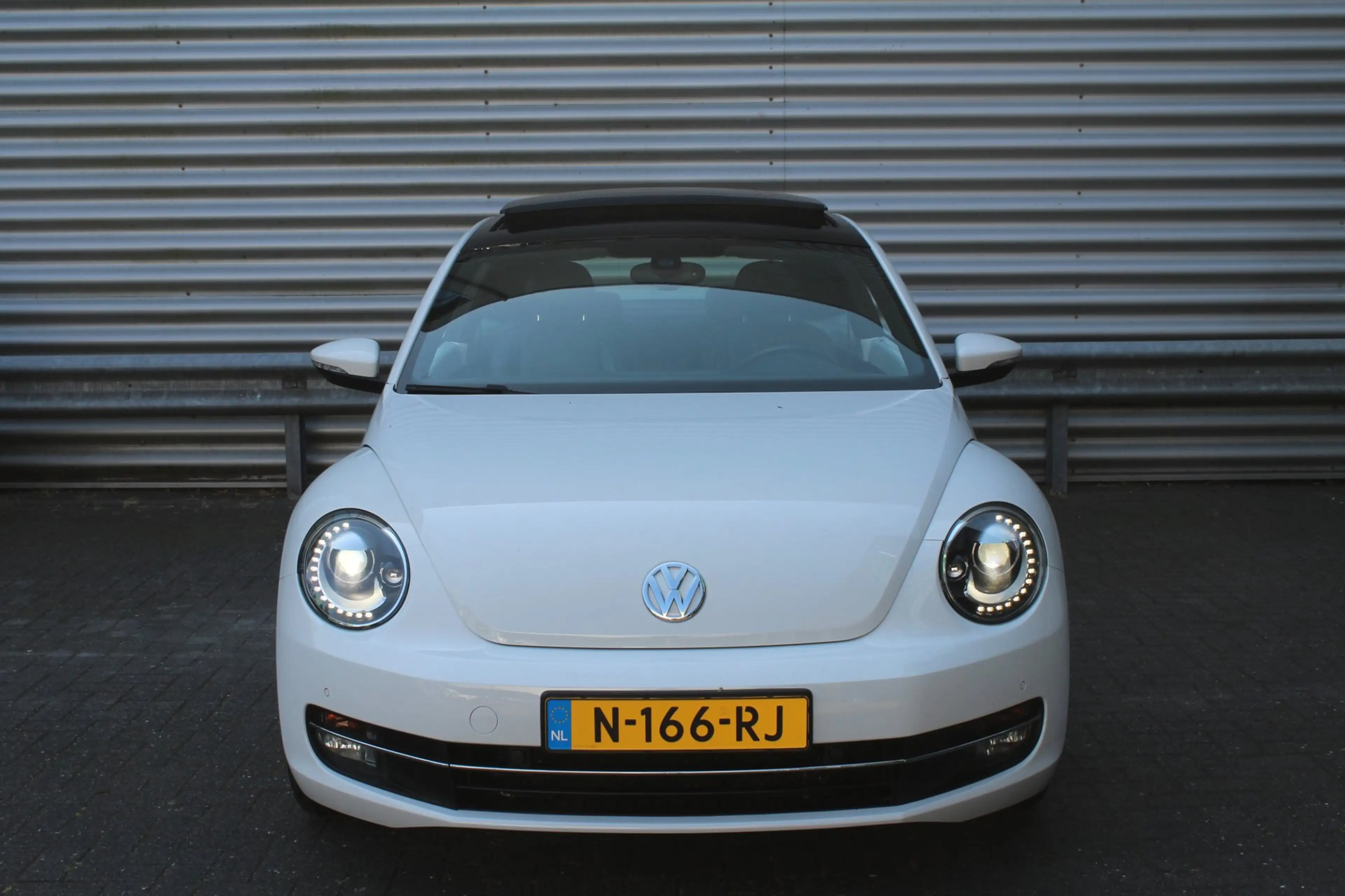 Volkswagen Beetle 1.4 TSI 161pk Sport Panoramadak Fender Leder — photo 2