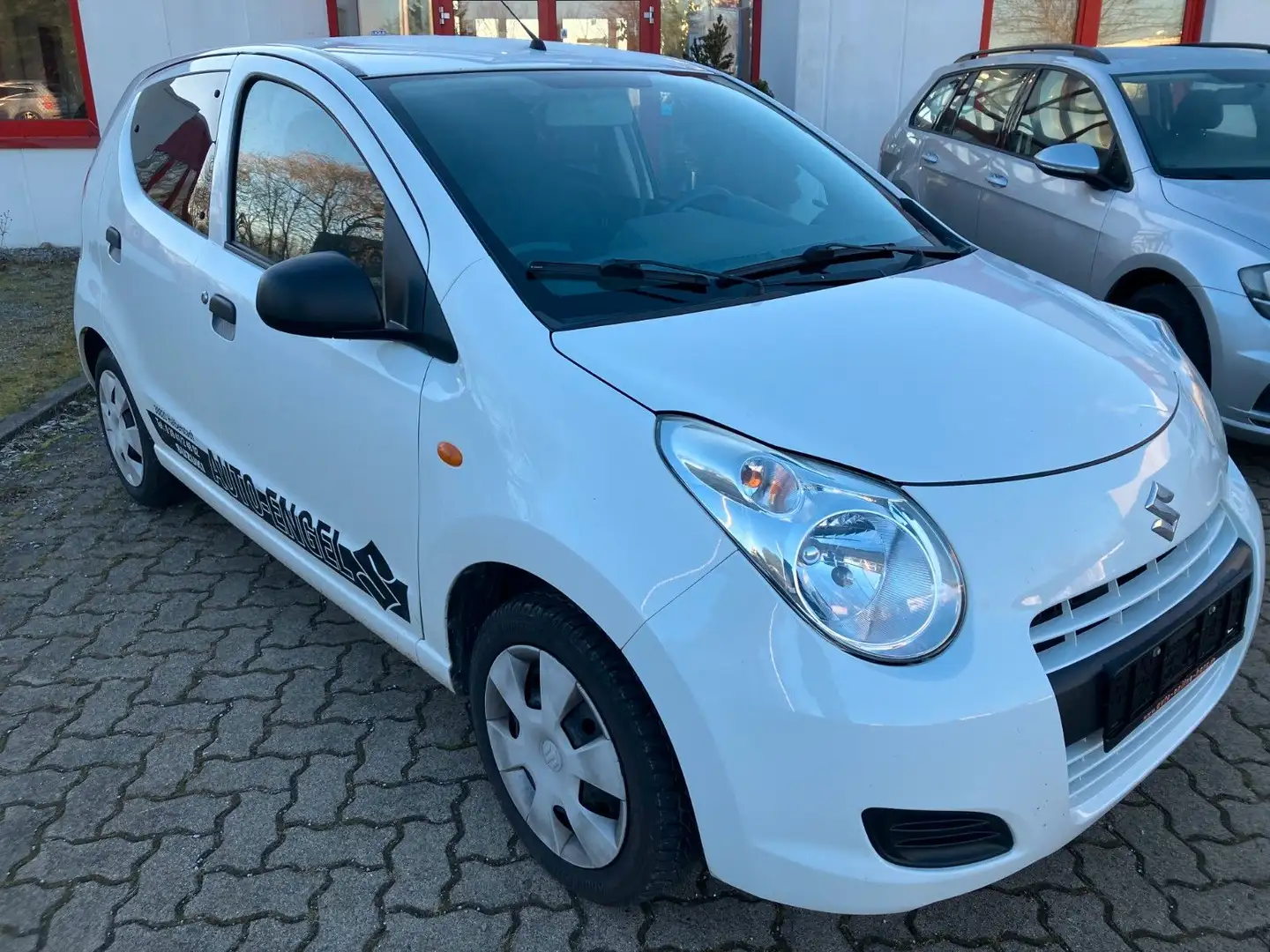 Suzuki Alto Basis 1.Hand Scheckheft Blanc - 1