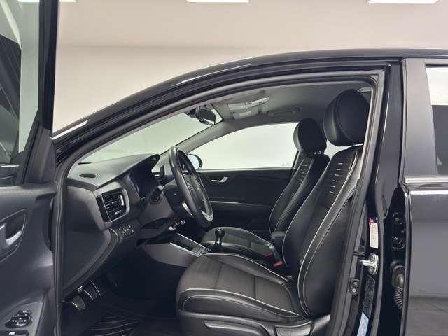 Kia Rio — photo 11