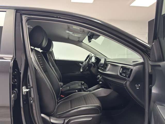 Kia Rio — photo 12