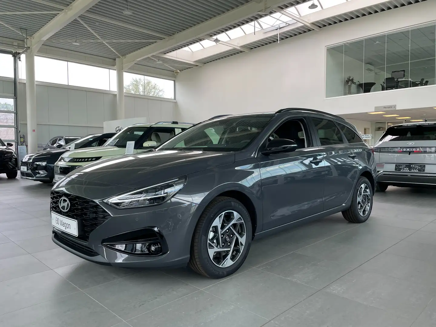 Hyundai i30 Wagon 1.5 T-GDi 48V Techno DCT Grijs - 1