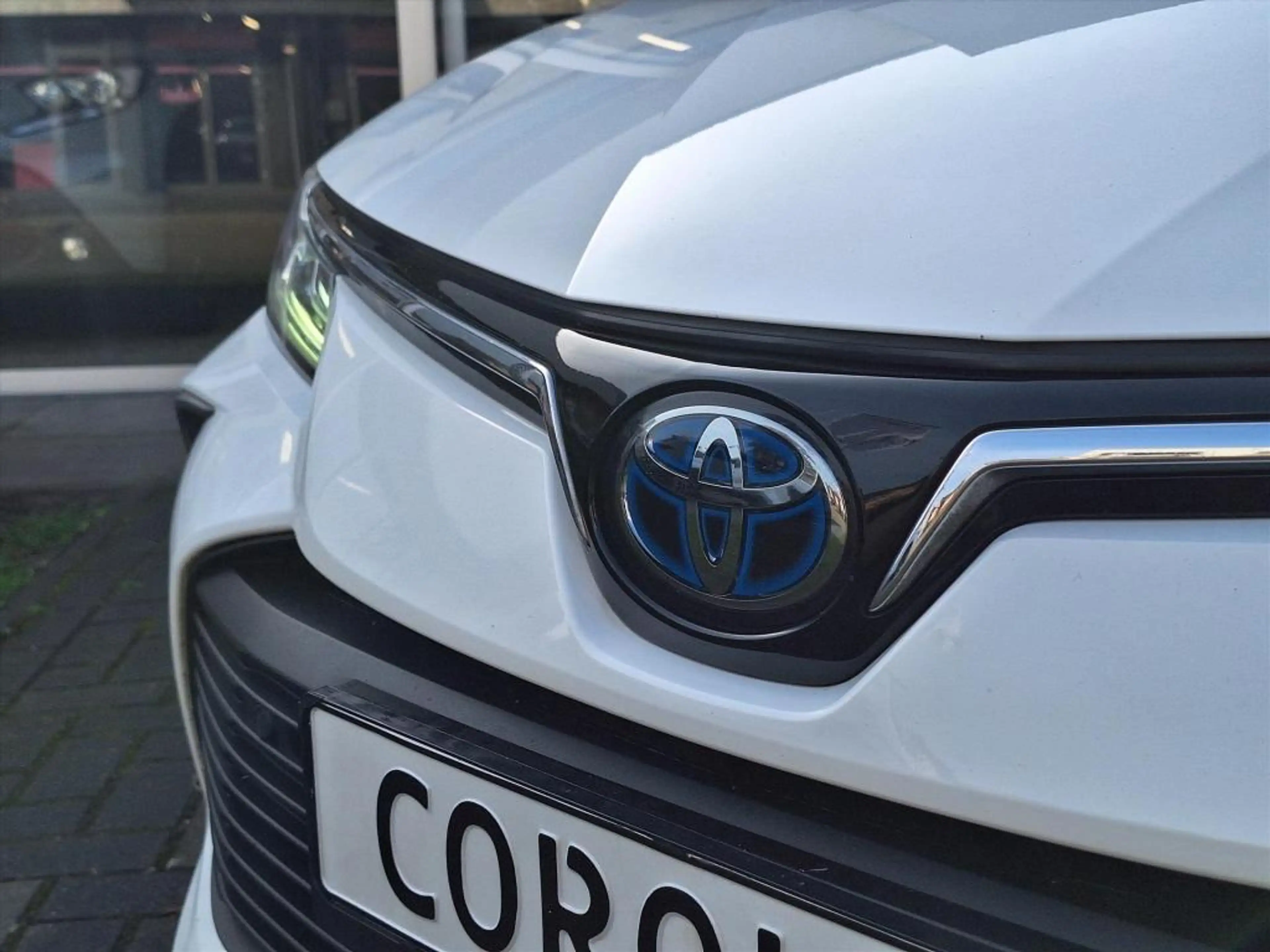 Toyota Corolla Sedan 1.8 Hybrid Style | Parkeersensoren, Navigati — photo 3