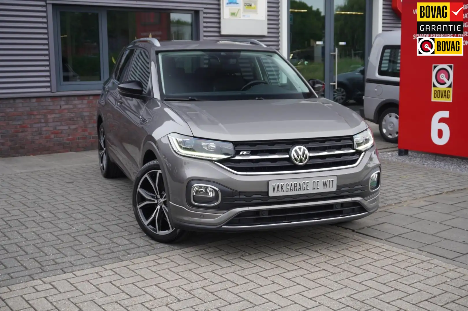 Volkswagen T-Cross 1.0 TSI Style / R-line / Winterset / Dealer onderh Gris - 1