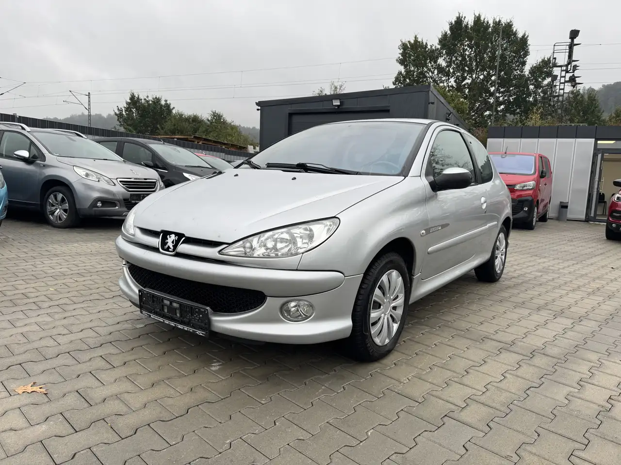 Peugeot 206 Quiksilver 1,6 16V 80 kW / Klimaautomatik — photo 1 of 11