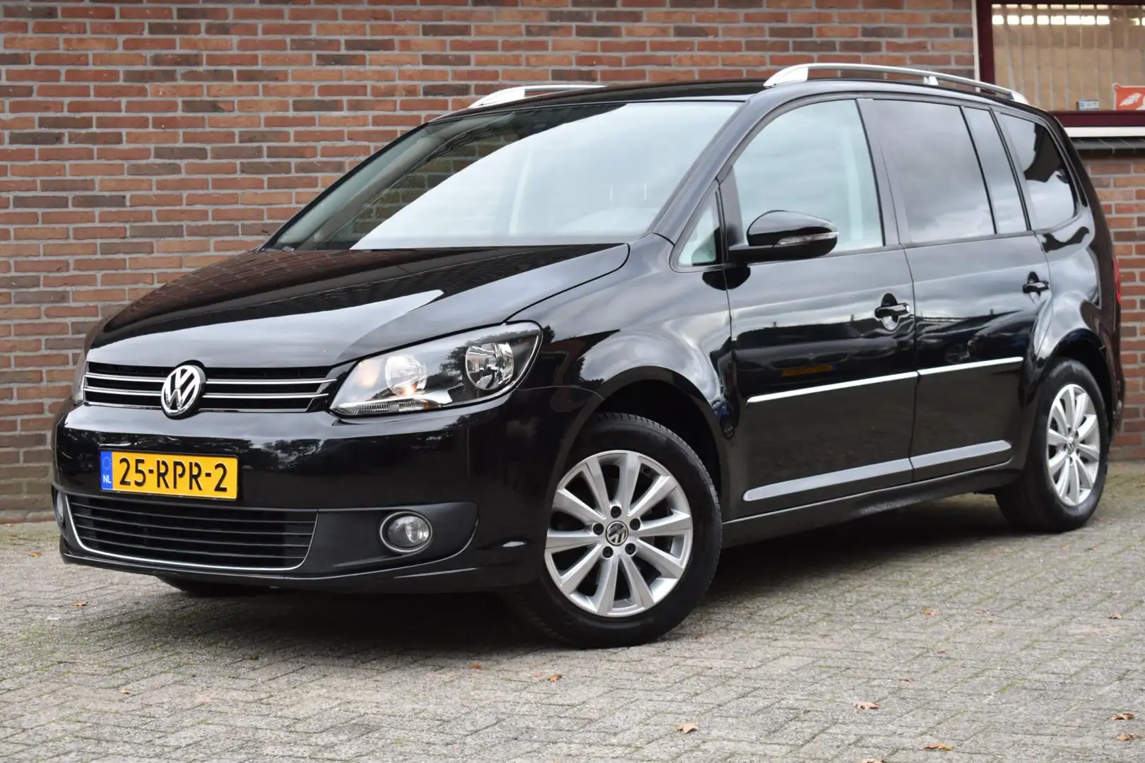 Volkswagen Touran 1.2 TSI Highline BlueMotion '11 Navi Clima Cruise Schwarz - 1