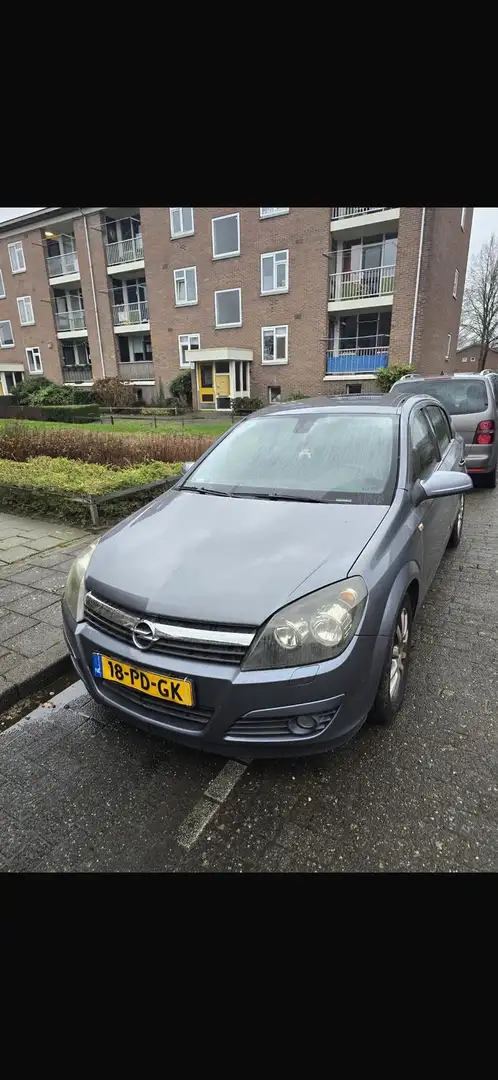 Opel Astra 1.4 Cosmo Grijs - 1