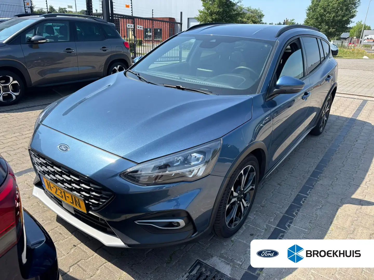 Ford Focus Wagon 1.0 EcoBoost Hybrid Active X Business | Trek Blauw - 1